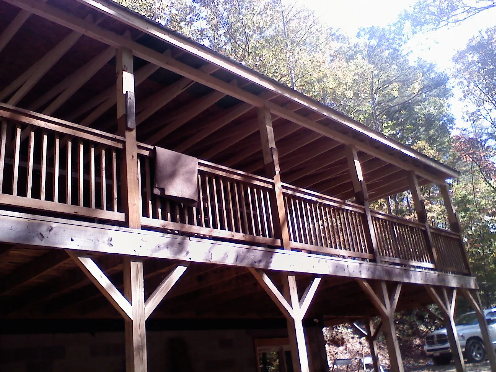 Timber framing under a new elevated porch and deck — Roof Leak Repair in Breezewood by Roofing Brothers